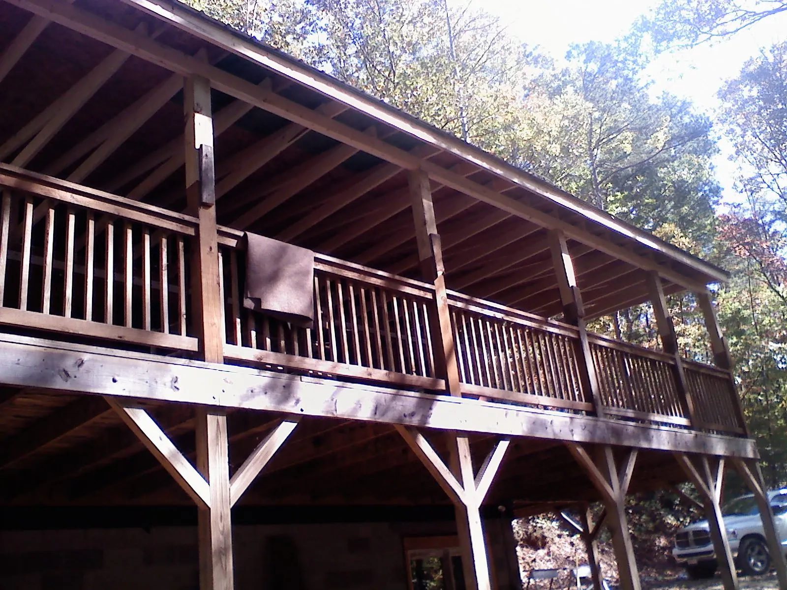Timber framing under a new elevated porch and deck — Roof Leak Repair in Saucier by Roofing Brothers